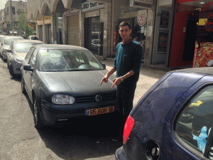 Imad Muna pointing to where the shooter stood