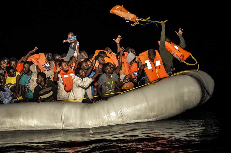 Desperate Migrants Flee amid Libyan Chaos