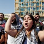 People rally in Beirut’s Martyrs Square on October 6 to protest a sharp drop in living conditions. (Anwar Amro/AFP via Getty Images)