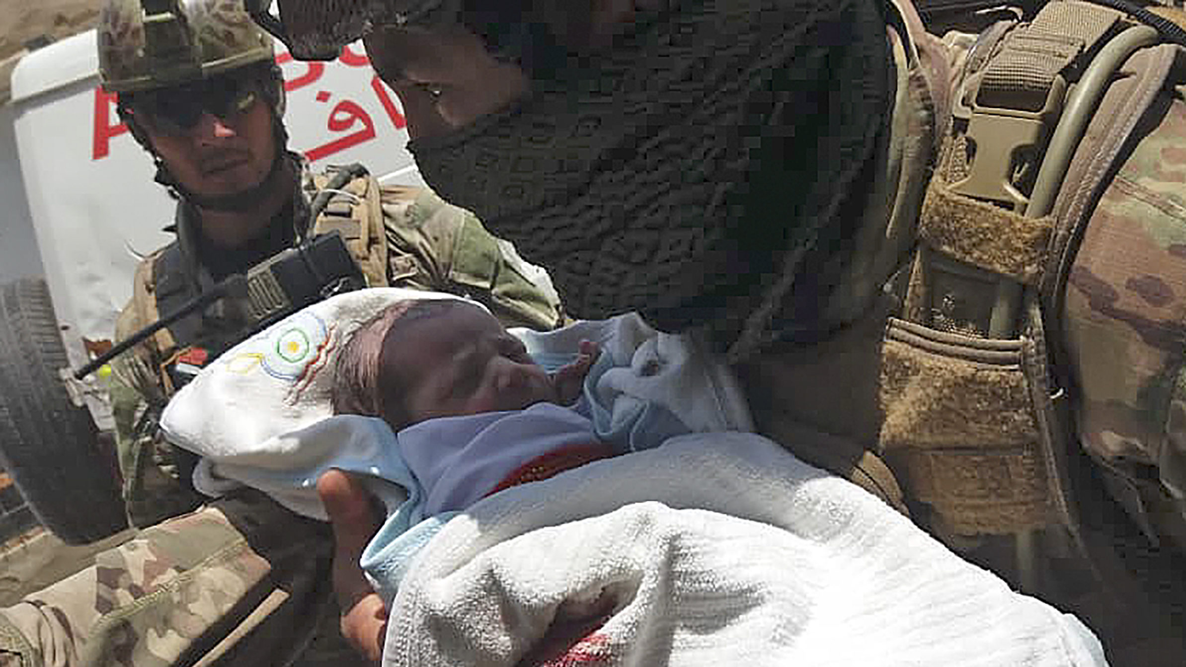 Dozens Dead in Afghanistan Attacks, Including Newborns
