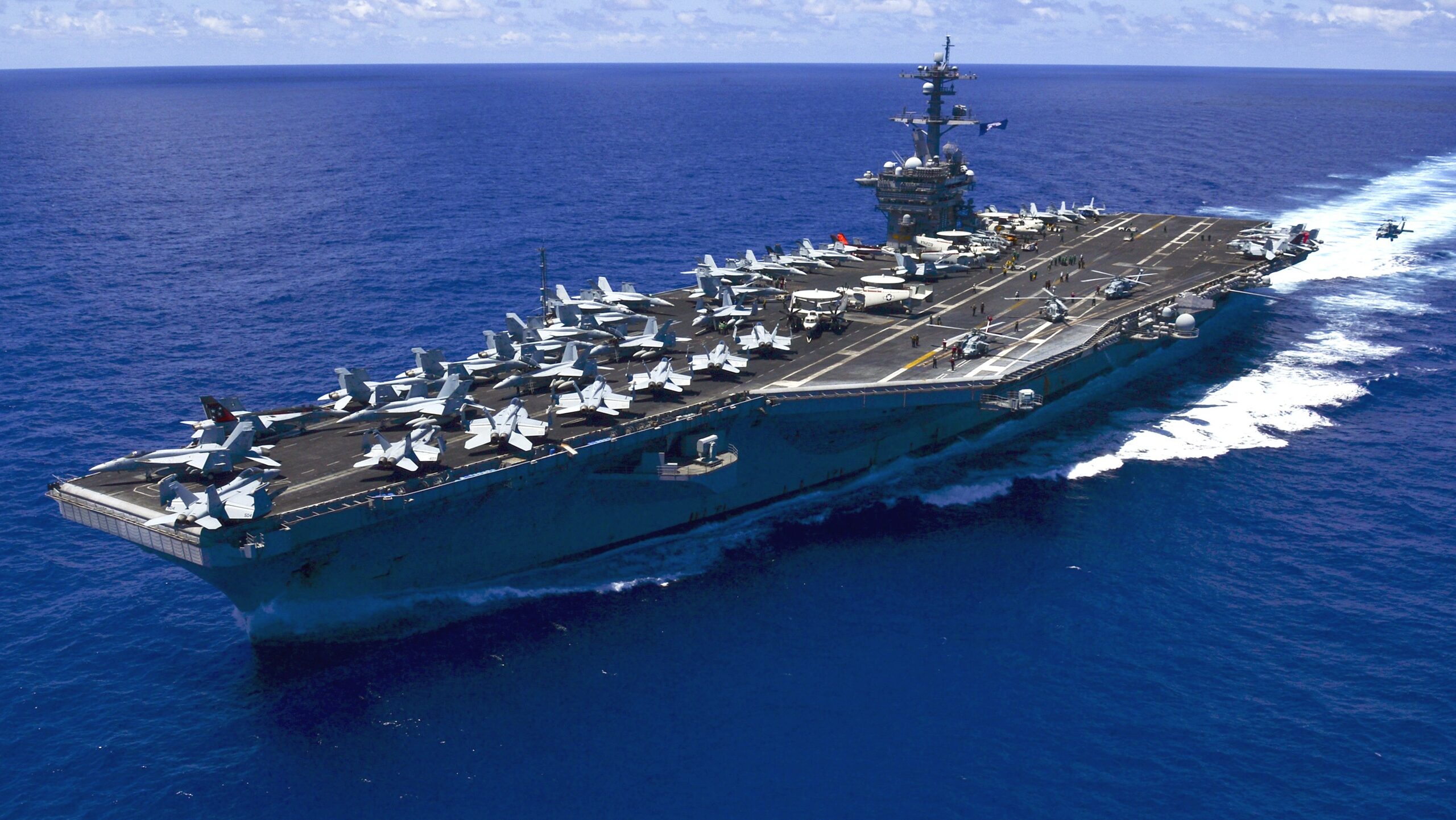 Houthi Forces Target US Warships and Israel in Coordinated Strikes