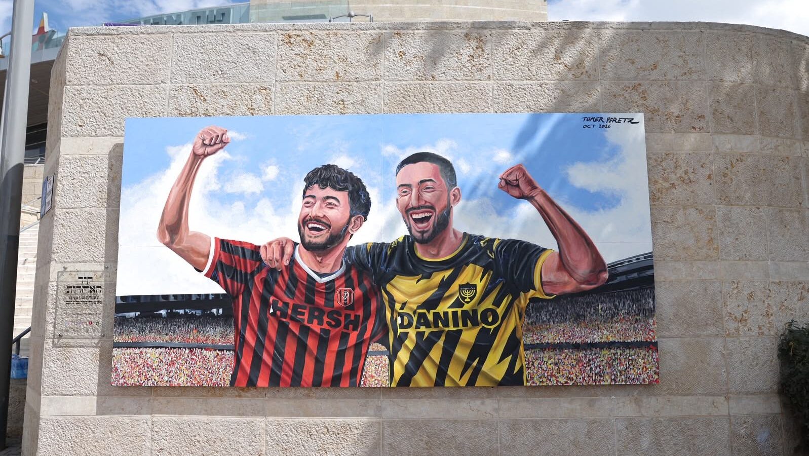 Jerusalem Unveils Teddy Stadium Mural Honoring Israeli Hostages Ori Danino, Hersh Goldberg-Polin 